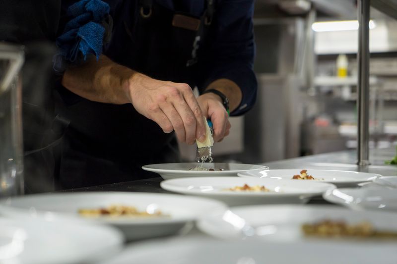 Wing Snob founder crafting signature wing recipes